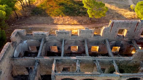 Bird's eye view of the abandoned monastery of Carmona, Seville with sidelight at sunset.