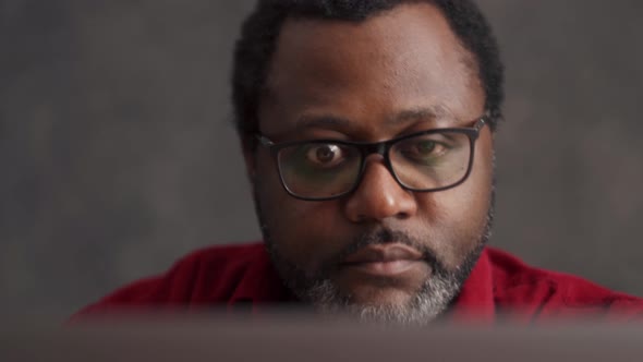 Handsome man working on laptop