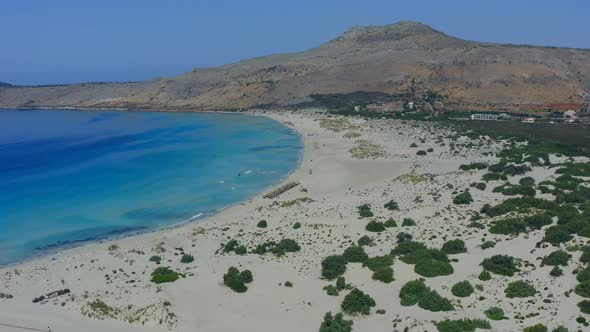 Aerial flying over Elafonisos Greek island, Simos double beac