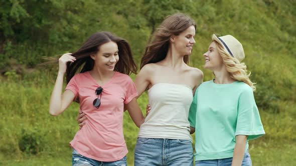 Happy Girls Friends Having Fun Outdoors In Nature.