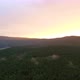 Sun lays down behind the forestal area mountain - VideoHive Item for Sale