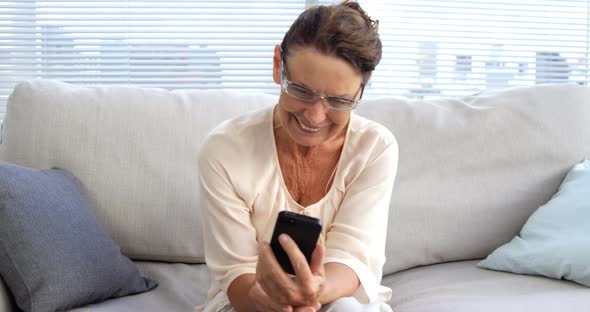 Woman using her mobile phone