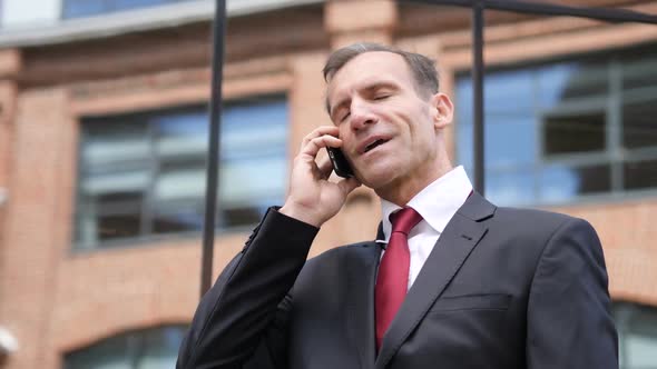 Phone Talk By Businessman