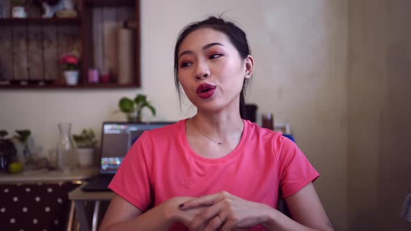 Cheerful female filming beauty video blog