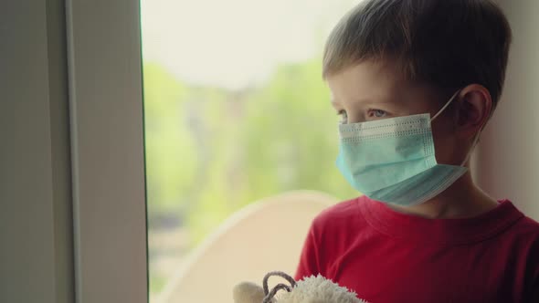 Cute Blond Boy in Quarantine at Home. Baby Is Struggling with Illness, Fever and Strong Cough