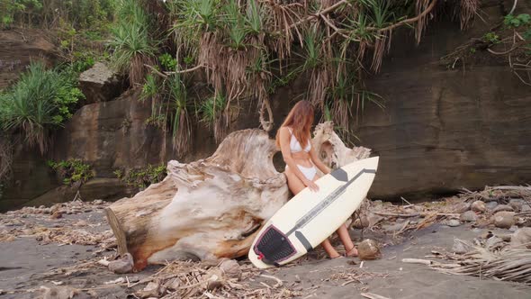 Woman With Surfboard Enjoying Vacation