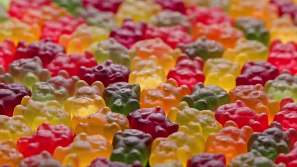 Full Frame Looped Spinning Background of Colorful Jelly Bear Candies