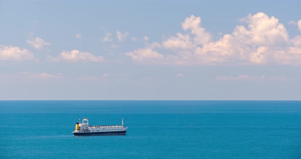 Seascape with cargo container industrial ship anchored waiting for entering Batumi port