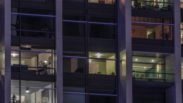 Big Glowing Windows in Modern Office and Residential Buildings Timelapse at Night