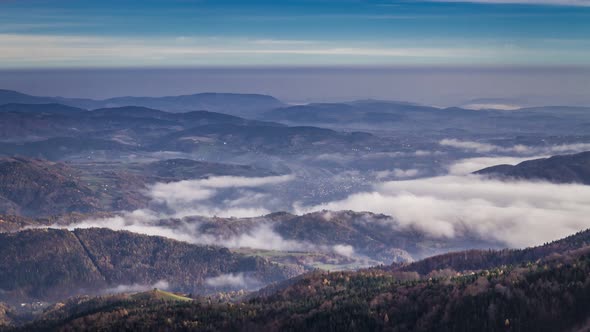 Flowing fog in the Tatras valley in the sunrise, Poland, Timelapse