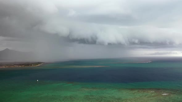 Storm Clouds in the Sky As It Moves Over the Ocean