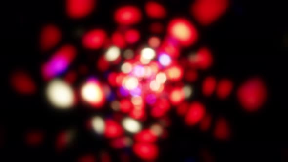 Red and Blue Spiral Light Bokeh Particles