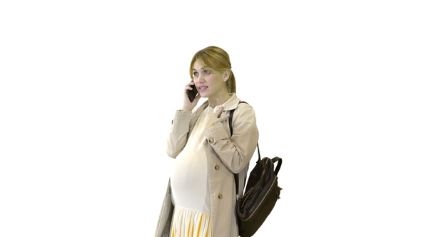 Pregnant Woman in A Cloak with Backpack Talking on The