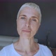 Blond woman with short hair and blue eyes posing at camera - VideoHive Item for Sale