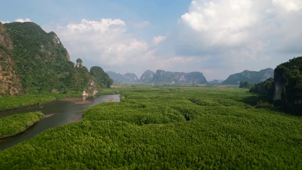 Drone flying over Ao Thalane mangroves and river in Krabi Thailand on a sunny day overlooking the mo