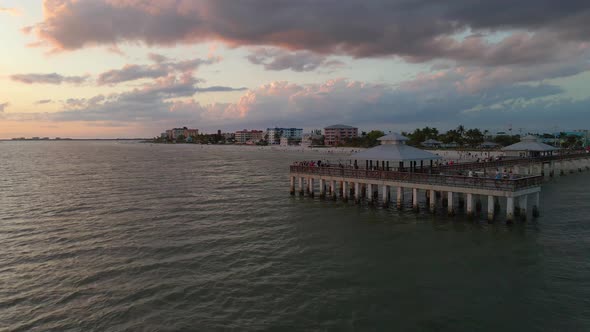 Aerial view of colorful sky during sunset over Fort Myers beach Pier, Florida