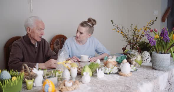 Happy Easter - Grandfather Talking with Granddaughter