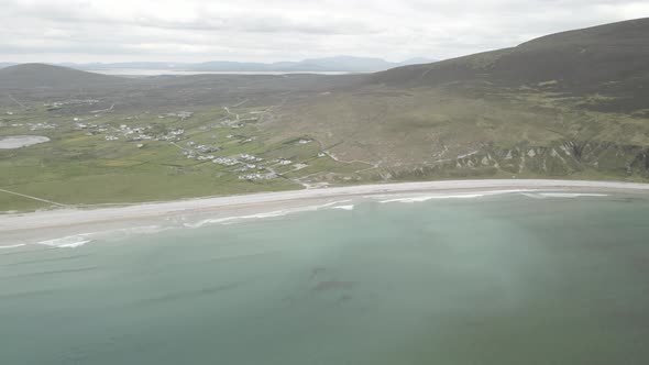 Serene View Of A Town On Keel Beachfront At The Foot Of Achill Head In County Mayo, Ireland. Aerial