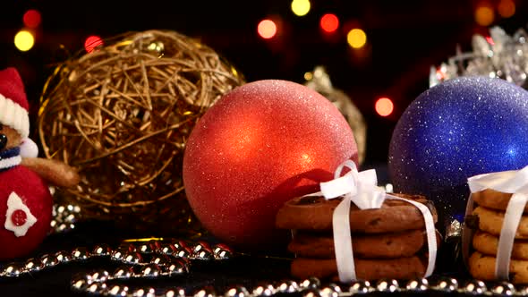 Christmas Cookies with Decoration on Black, Bokeh, Light, Garland, Cam Oves To the Left, Close Up