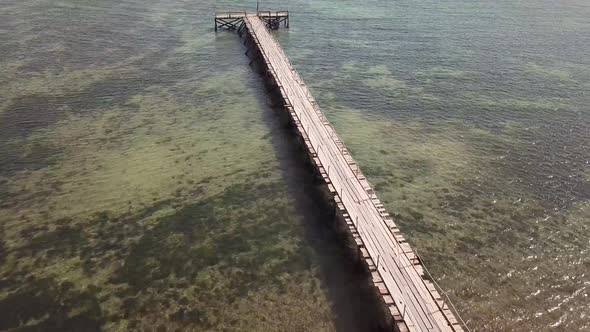 Drone view of a wooden pier in North Africa