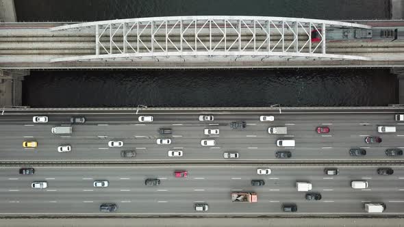 Aerial Top View of Traffic on a Car and Train Bridge