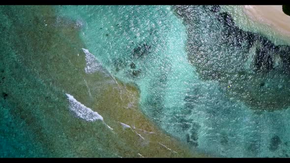 Aerial texture of idyllic coast beach adventure by turquoise water with white sandy background of a 