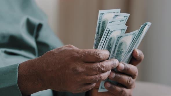 Closeup Old Male African American Hands Counting Money Dollars Indoors