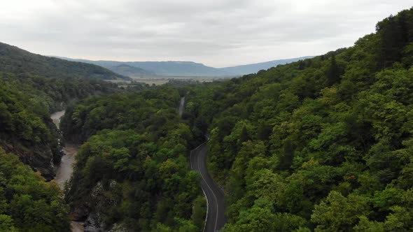 Aerial view to the asphalt road in mountains. Aerial view of the Canyon.