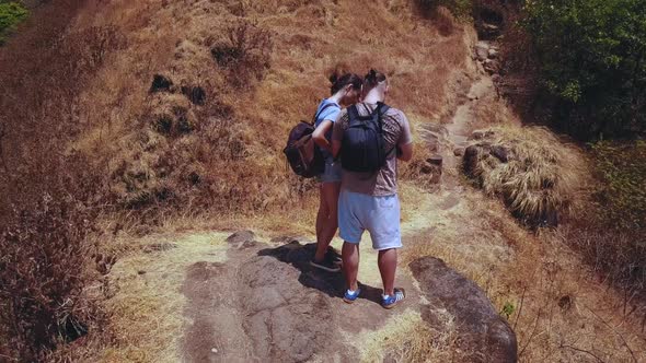 Aerial Turist Romantic Passionate Couple Standing in Love Embrace on Top Enjoying Scenic Beautiful