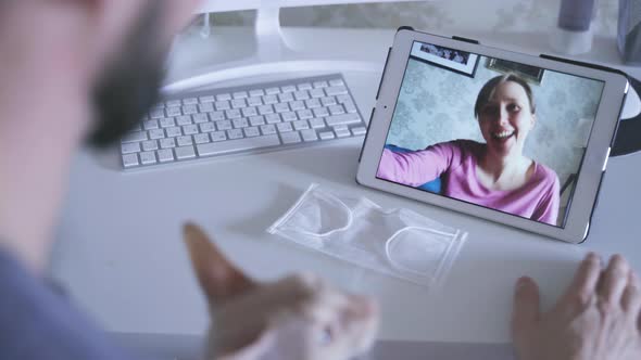 Young Man and Woman are Having Video Call During Viral Quarantine at Home Spbas