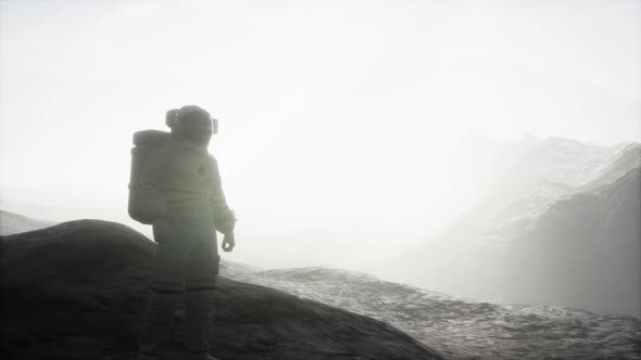 Astronaut on Another Planet with Dust and Fog alt