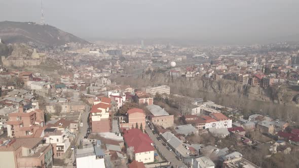 Tbilisi, Georgia - April 3 2021: Flying over Ortachala district in old Tbilisi.