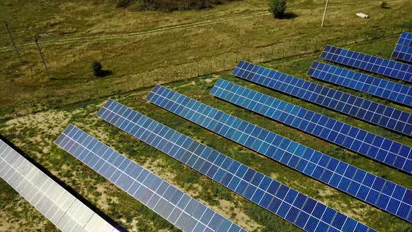 Solar Panels In Power Station. Solar photovoltaics panels in solar power station on meadow