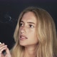 Slow motion shot of young woman smoking - VideoHive Item for Sale
