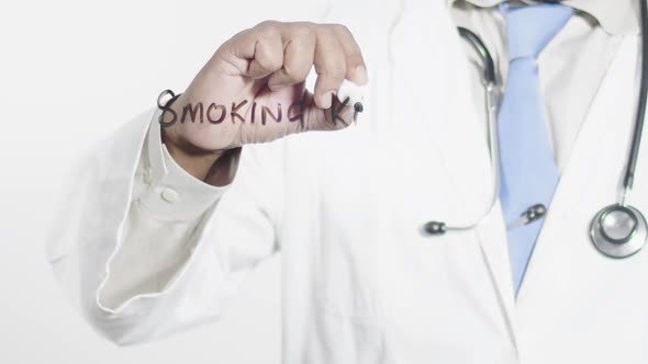 Asian Doctor Writes Smoking Kills 2
