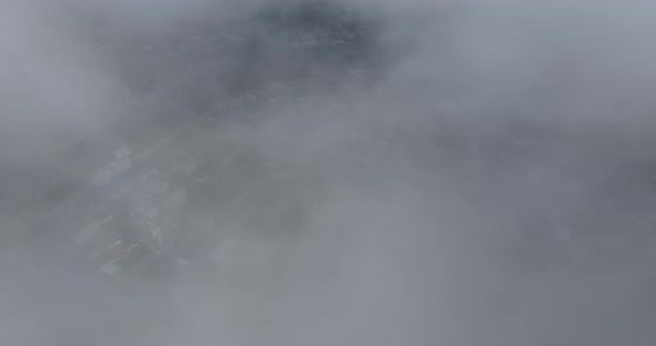 Thick Clouds Form In The Sky, Approaching The City. Change Of Weather