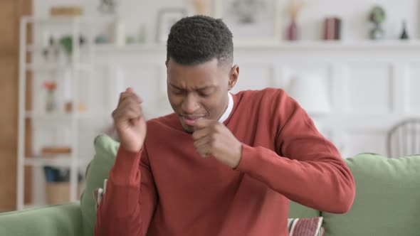 Portrait of Happy African Man Dancing in Office