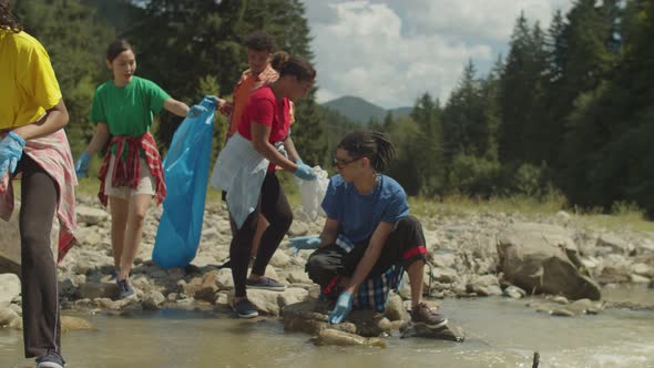 Portrait of Diverse Multiracial Charity Activists Cleaning Mountain River From Plastic Waste / Videohive, Stock footage, Nature
