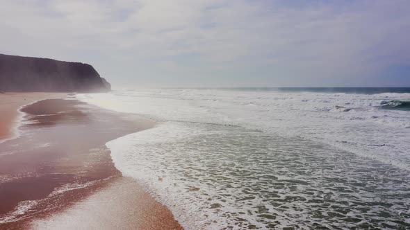 Praia Grande Beach at Sintra, Lisbon, Portugal, on the Atlantic Coast, a Beautiful Sandy Beach with