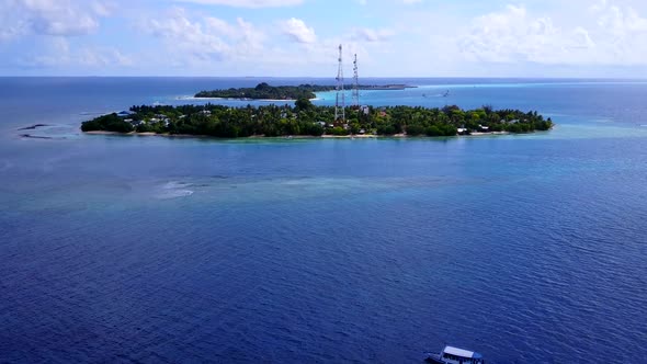 Aerial drone travel of lagoon beach trip by blue lagoon and sand background