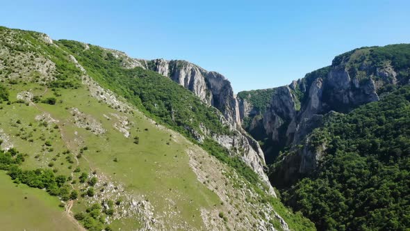 The majestic cliffs of Turda Gorge, a natural reserve on the Hasdate River near Transylvania, Romani