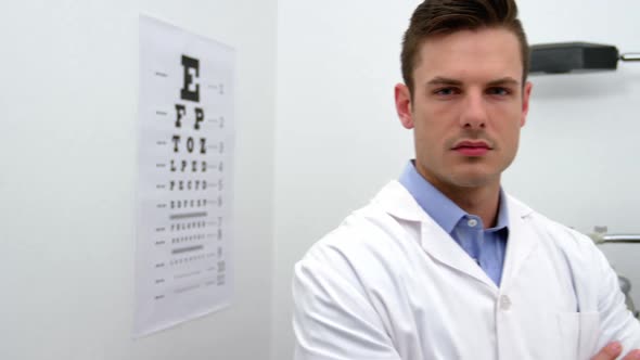 Optometrists standing in ophthalmology clinic