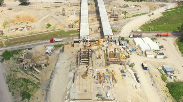 Aerial view of the construction of the bridge and the highway passing