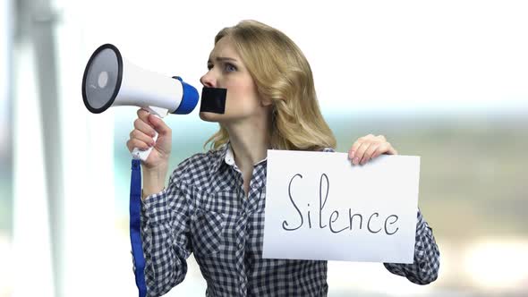 Silenced Woman with Megaphone Can Not Speak