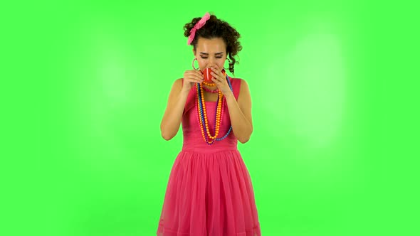 Girl Drinks Coffee and Enjoying on Green Screen