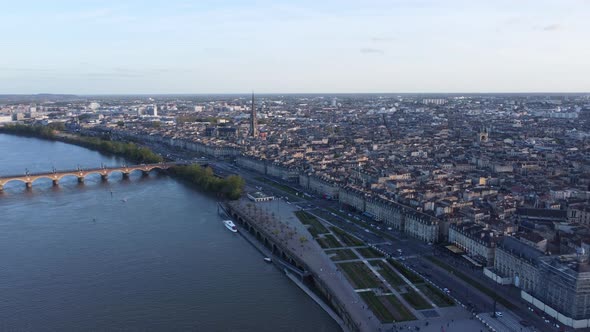 Aerial View Of The Port City Of Bordeaux On The Garonne River In France. Historic Pont de Pierre And