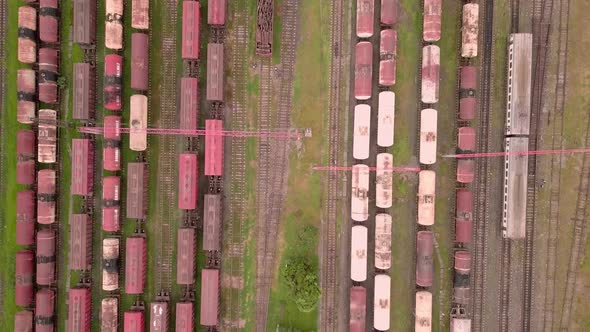 Drone, marshalling yard. there are a lot of railway cars there. depot. Trains .