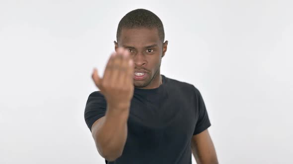 Angry Young African Man Ready for Fight Boxing on White Background