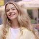 Smiling Woman Standing on Street - VideoHive Item for Sale