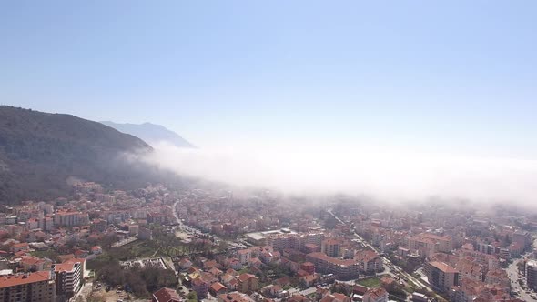 Panoramic View of Modern Houses of Budva in the Fog